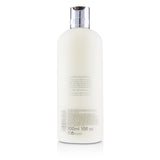 Molton Brown Glossing Conditioner with Plum-Kadu (Dull-Looking Hair)
