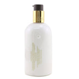 Molton Brown Mesmerising Oudh Accord & Gold Hand Lotion 300ml/10oz