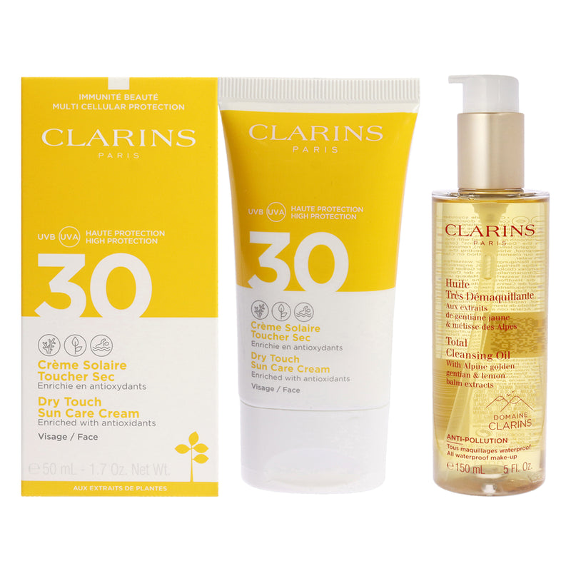 Clarins Total Cleansing Oil and Sun Care Cream SPF 30 Kit by Clarins for Unisex - 2 Pc Kit 5oz Cleanser, 1.7oz Sunscreen