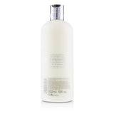 Molton Brown Glossing Conditioner with Plum-Kadu (Dull-Looking Hair) 